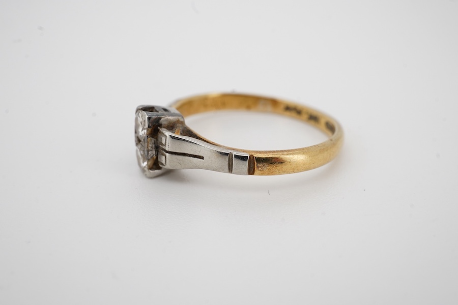 An Art Deco 18ct, plat and two stone diamond set ring, size K, gross weight 2.5 grams. Condition - fair to good